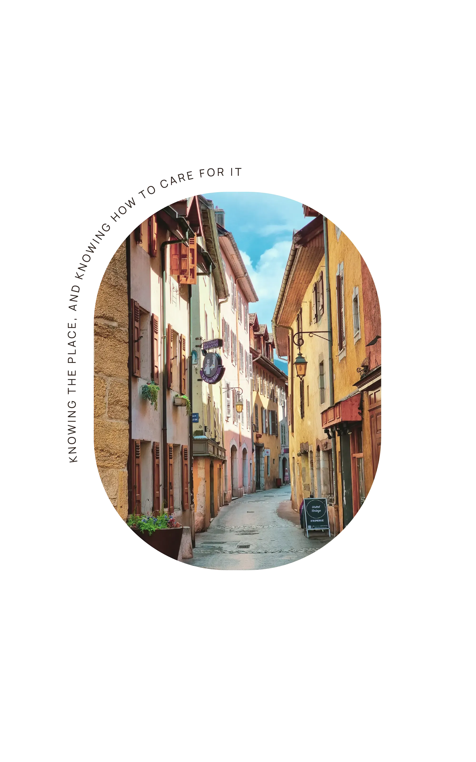Old street around Lake Annecy with the words Entrust the keys and let them be cared for